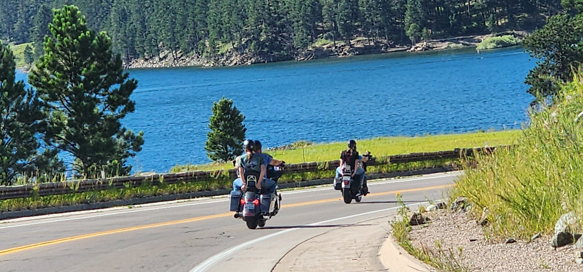 Iron Sagebrush motorcycle lifestyle scene by the water