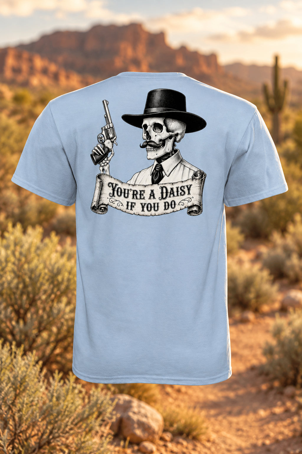 Doc Daisy Iron Sagebrush T-Shirt in light blue tri-blend with a skeleton cowboy graphic and You're a Daisy slogan