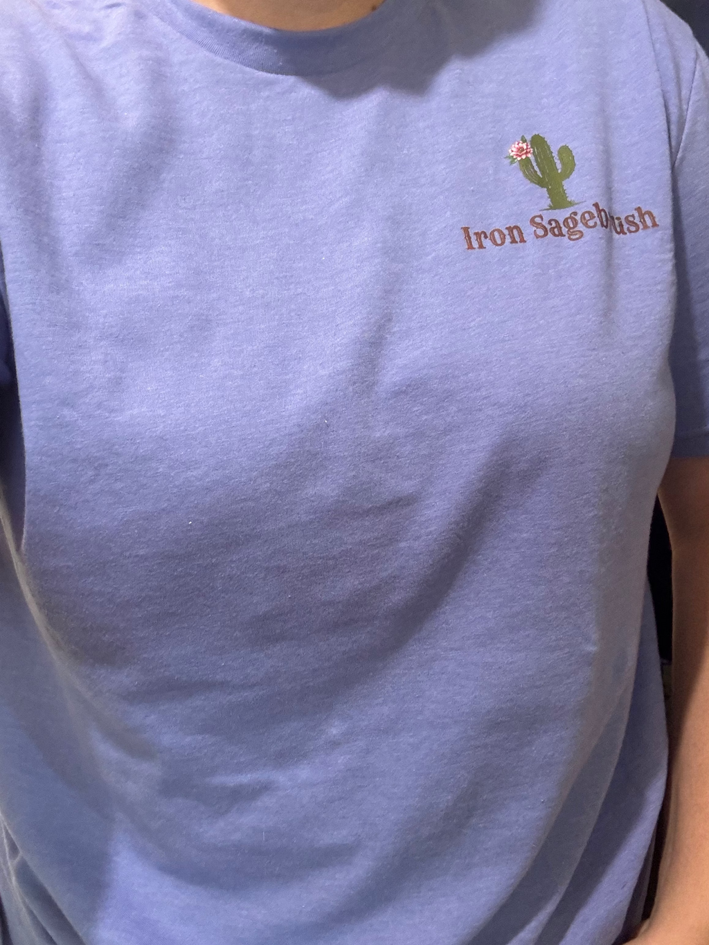 Cactus Logo women's T-shirt in purple worn with the Iron Sagebrush cactus chest logo