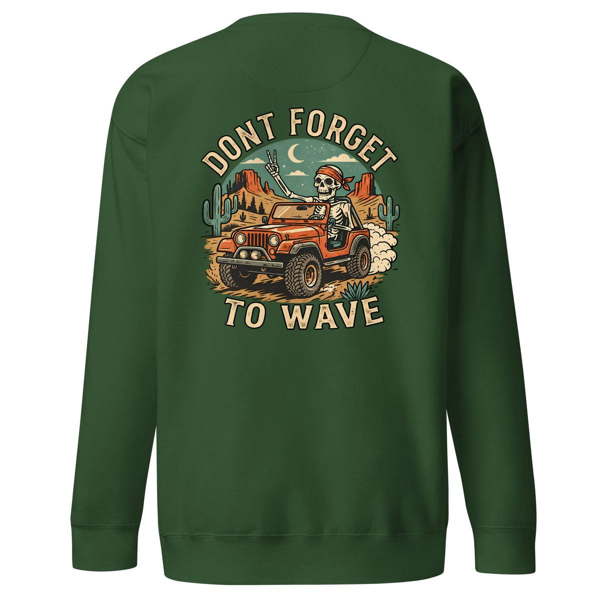 A dark green crewneck sweatshirt shown from the back, featuring a large graphic print of a skeleton driving an orange jeep through a desert landscape under a crescent moon, with the text 'DONT FORGET TO WAVE'.